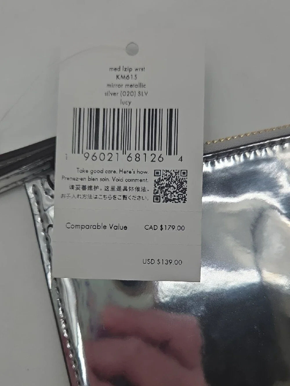 kate spade Metallic Silver Zip Wristlet